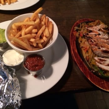 Captain Americas - Chicken Fajitas with fries - New American Near Me - Blanchardstown, D