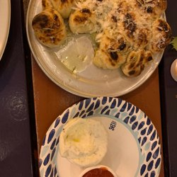 Old Soul Pizza - Garlic knots with homemade white sauce and red sauce. Amazing!