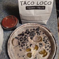 Taco Loco - This is supposed to be bean dip and chips. It's liquidy like water smells funky will it make me sick? Yuck!