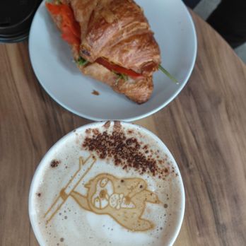 Caffé Capriccio - Latte art! And a salmon croissant sandwich - Cafes Near Me - Granger, Indiana