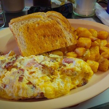 Northgate Diner - Meat lovers omelet with sausage bacon and ham, country home fries, and sourdough toast. - Diners Near Me - Ocala, Florida
