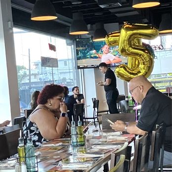Los Pinos Cafe - MANY celebrate family gatherings here! This was for a gentleman's 75th Birthday ! ¡Feliz Cumple! - Puerto Rican Near Me - San Juan, Puerto Rico