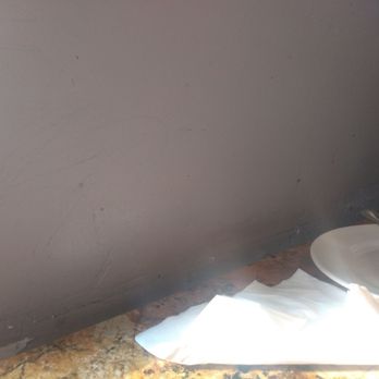 Tomatina - I'm almost certain they have never cleaned the wall right next to the table - Italian Near Me - Roseville, California Tomatina - I'm almost certain they have never cleaned the wall right next to the table - Italian Near Me - Roseville, California