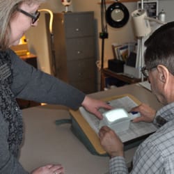 Wisconsin Council of the Blind & Visually Impaired - Low Vision Therapist Amy Wurf administering a Low Vision Evaluation