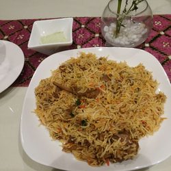 Kabab & Curry Restaurant & Grill - Goat Biryani (#31). Goat meat cooked with delicious, spiced basmati rice