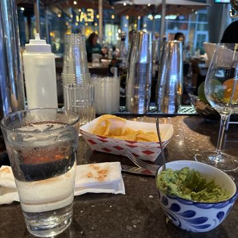Cielo Cocina Mexicana - a glass of water and a bowl of chips - Mexican Near Me - Bellevue, Washington
