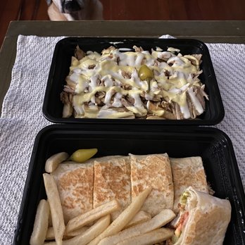 Secret Shawarma - Top: Secret Fries with Beef Shawarma. Bottom: Chicken Cream Chop. Very Top: Winston waiting for me to drop something... - Mediterranean Near Me - San Diego, California Secret Shawarma - Top: Secret Fries with Beef Shawarma. Bottom: Chicken Cream Chop. Very Top: Winston waiting for me to drop something... - Mediterranean Near Me - San Diego, California