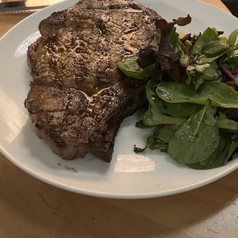 Saltbrick Prime - Aged ribeye with greens - Steakhouses Near Me - Branford, Connecticut