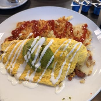 Broken Yolk Cafe - CALIFORNIAN omelette Bacon, homefries, American cheese. Topped with avocado and sour cream. (1050 cal) - American Near Me - Buena Park, California Broken Yolk Cafe - CALIFORNIAN omelette Bacon, homefries, American cheese. Topped with avocado and sour cream. (1050 cal) - American Near Me - Buena Park, California