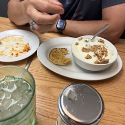 Hubby ate the chorizo and eggs and was approaching the yogurt and fruit bowl. Hubby ate the chorizo and eggs and was approaching the yogurt and fruit bowl.