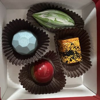 La Chocolatería - box of 4 truffles - from top, clockwise: pistachio, passionfruit, mango and hazelnut - Chocolatiers & Shops Near Me - Aguadilla, Puerto Rico
