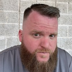 Twin Arch Barber & Stylists - Hard part and beard clean-up.