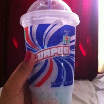 7-Eleven - a hand holding a cup of soda - Convenience Stores Near Me - Downey, California 7-Eleven - a hand holding a cup of soda - Convenience Stores Near Me - Downey, California
