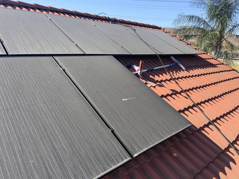 Slide of Roof Doctor Solar Panel Cleaning