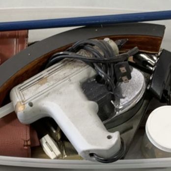 Orange County Packouts - Glue gun, broken piece of wood. a bunch of stuff that I can't see. - Damage Restoration Near Me - Santa Ana, California Orange County Packouts - Glue gun, broken piece of wood. a bunch of stuff that I can't see. - Damage Restoration Near Me - Santa Ana, California