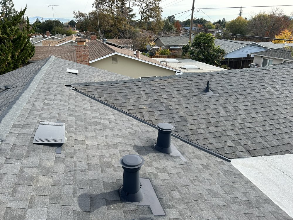 Slide of Tip Top Roofing