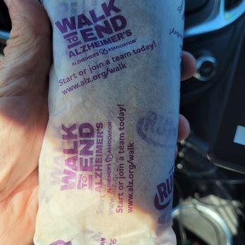 Runza - a person holding a bag of food - New American Near Me - York, Nebraska
