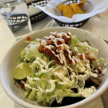 Mexico City Cafe - Christmas in a bowl. Actually carnitas w black beans, lettuce and some art. - Mexican Near Me - St Louis Park, Minnesota Mexico City Cafe - Christmas in a bowl. Actually carnitas w black beans, lettuce and some art. - Mexican Near Me - St Louis Park, Minnesota