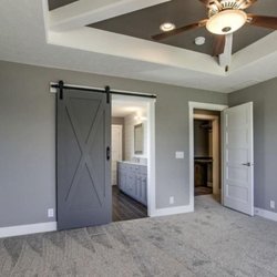 Accupro Renovations - Master bedroom remodel with Barn door install in Buford GA