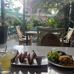 Lilikoi margarita, empanadas and jerk chicken Lilikoi margarita, empanadas and jerk chicken