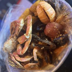 Hook & Reel Cajun Seafood & Bar - Mix & Match Your Catch: Shrimp (head-off), Black Mussels, Lobster tail, Dungeness Crab. Sauce: Hook & Reel Special Blend Spicy!