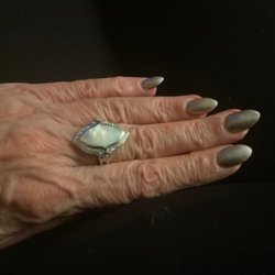 Emerson Fine Jewelry - Mother of pearl ring with diamonds in a white gold setting.