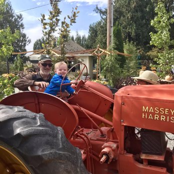 Gordon Skagit Farms - My son and my dad enjoying the tractor - Fruits & Veggies Near Me - Mount Vernon, Washington Gordon Skagit Farms - My son and my dad enjoying the tractor - Fruits & Veggies Near Me - Mount Vernon, Washington
