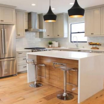 Build Strong Construction - a kitchen island with stools - General Contractors Near Me Build Strong Construction - a kitchen island with stools - General Contractors Near Me