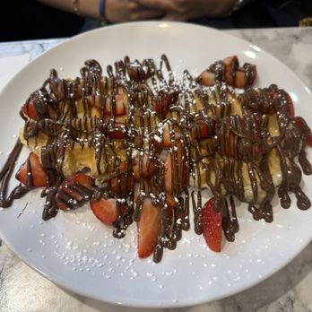 Le Sultan Creperie  - Waffle with strawberries and added chocolate drizzle - Cafes Near Me - Quebec City, Quebec