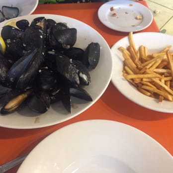 Rendez-Vous Bakery - Mussel in white wine and garlic broth plus an order of french fries. - French Near Me - Aventura, Florida Rendez-Vous Bakery - Mussel in white wine and garlic broth plus an order of french fries. - French Near Me - Aventura, Florida
