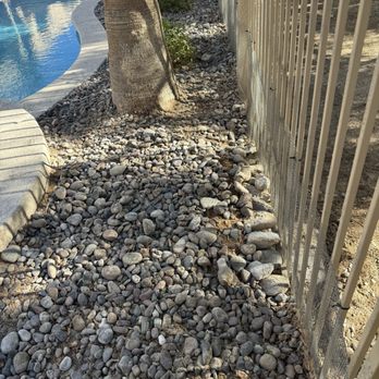 WestCo Tree Service - After tree removal. The big rocks were placed there to cover a hole until a mason can fix the wall that was damaged by the roots. - Tree Services Near Me WestCo Tree Service - After tree removal. The big rocks were placed there to cover a hole until a mason can fix the wall that was damaged by the roots. - Tree Services Near Me