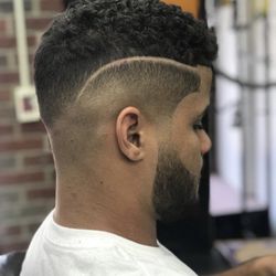 The Taper’s Club - This is a picture of a haircut from a barber in this barbershop.   -BabyBryan