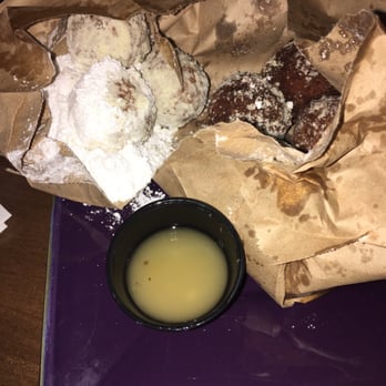 The Pub - They got donuts served in a bag of powder sugar and the whiskey sauce is to die for! Bad pic but omg you're gonna love them ! - Irish Near Me - San Diego, California