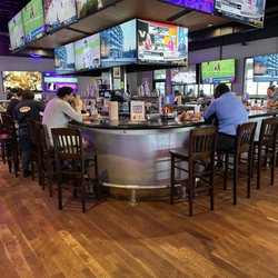 Pluckers Wing Bar - Southpark Meadows - View of the bar area.