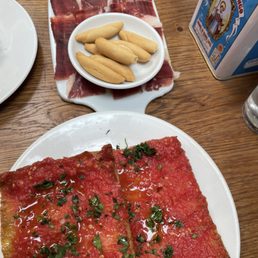 Jamon Iberico de bellota (acorn fed iberico ham), pan con tomate( Catalan coca bread p, pensar tomatoes,olive oil, garlic, parsley). Jamon Iberico de bellota (acorn fed iberico ham), pan con tomate( Catalan coca bread p, pensar tomatoes,olive oil, garlic, parsley).