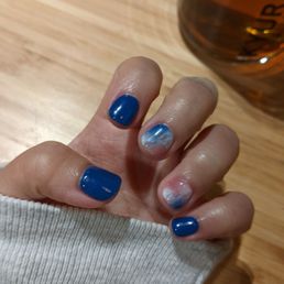 Gel mani with blue/pink marble design Gel mani with blue/pink marble design