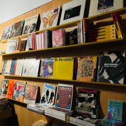 a bookshelf full of vinyl records a bookshelf full of vinyl records