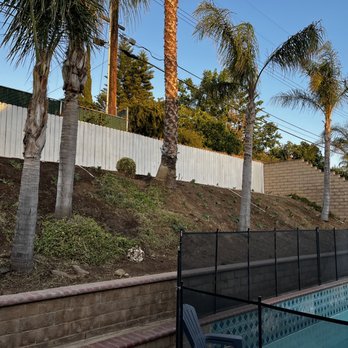 Greenside Landscaping - Our slope after - Artificial Turf Near Me