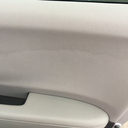 stain on passenger door from window tint application.
