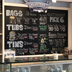 Clusters Handcrafted Popcorn -Wildwood - Pricing behind the counter.