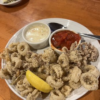 Carrabba's Italian Grill - Calamari - Happy hour portion. Comes with red and creamy sauce - Italian Near Me - Orlando, Florida Carrabba's Italian Grill - Calamari - Happy hour portion. Comes with red and creamy sauce - Italian Near Me - Orlando, Florida