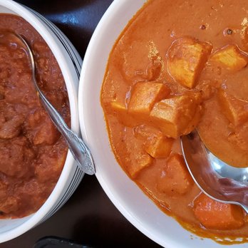 Tikka Lounge - Lamb vindaloo and butter chicken. I transferred the curries out of the horrible containers as quickly as I could. - Indian Near Me - Poway, California