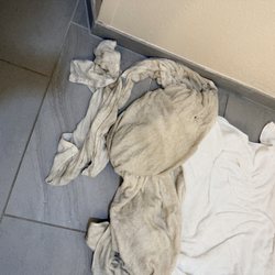 Candlewood Suites Conway - Nasty towels on the left from me mopping the floor with my feet because it was so gross.