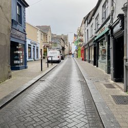 The Rafter Dempsey's - A look down Friary Street towards Rafters Dempsey on the right and a parking garage just passed it.