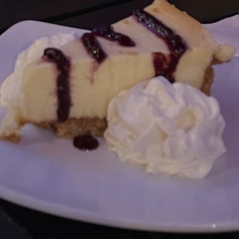 Farrar's Bistro - This was The cheesecake with raspberry drizzle with whip, whipped cream delicious - American Near Me - Vancouver, Washington Farrar's Bistro - This was The cheesecake with raspberry drizzle with whip, whipped cream delicious - American Near Me - Vancouver, Washington