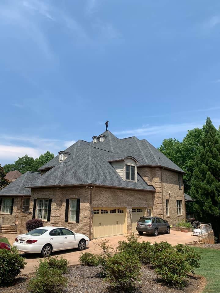 Slide of The Roofing Company