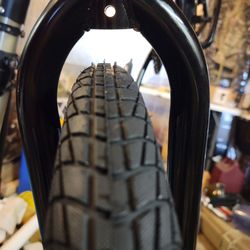 Wheel is off center and crooked due to misaligned tabs on fork and poor build quality. This is a safety issue.