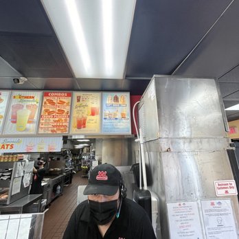 Wienerschnitzel - a man in a restaurant - Fast Food Near Me - Norco, California