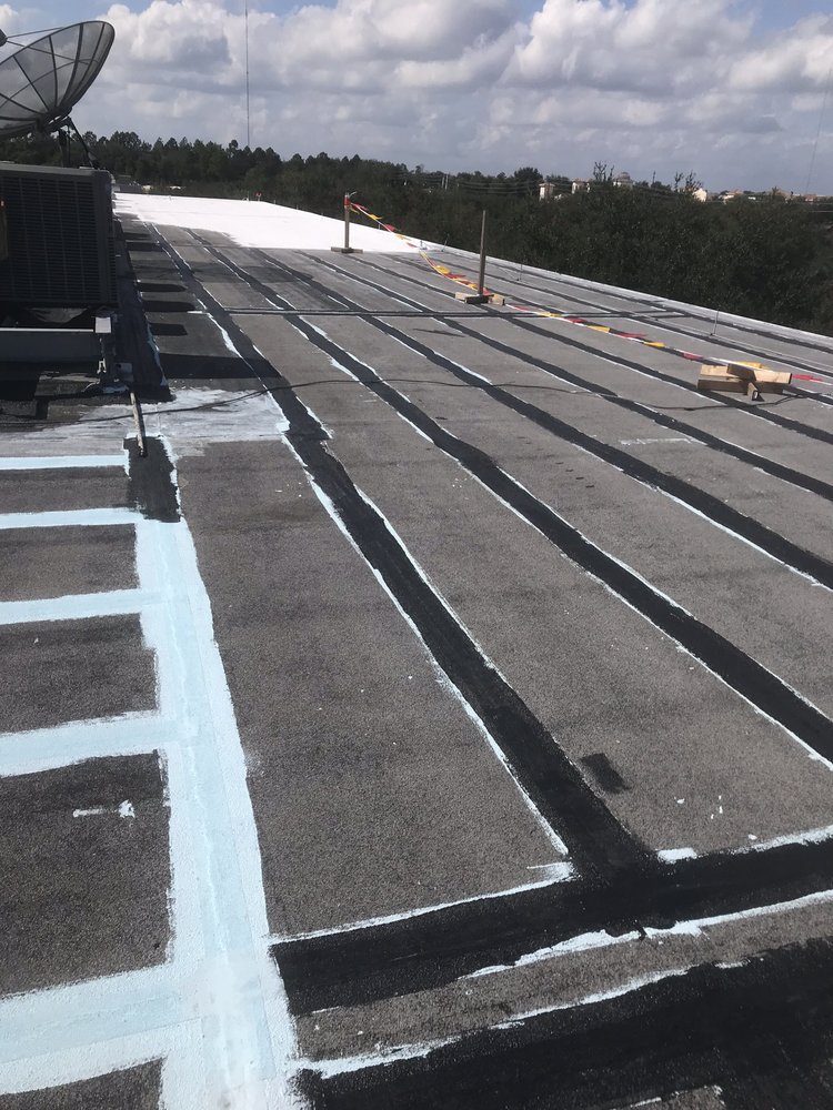 Slide of Dino Roofing Services