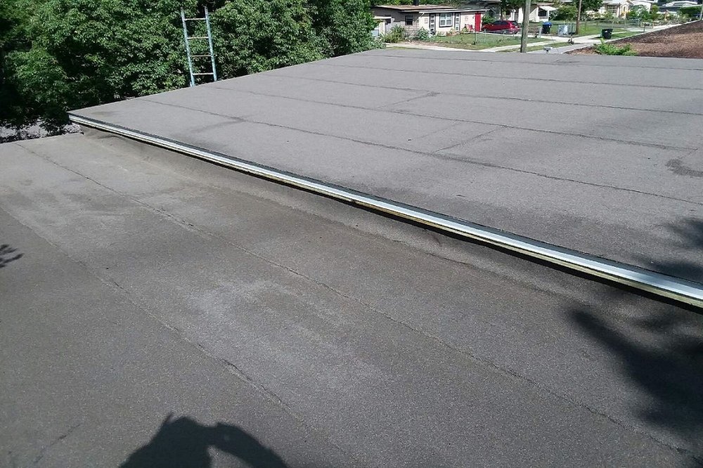 Slide of G&A Certified Roofing North